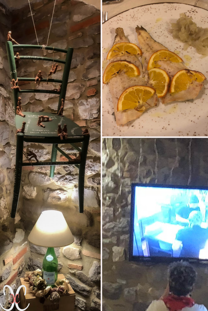 Restaurant mit ausgefallenen Accessoires, ein Monitor zeigt den Gästen die Küche life
